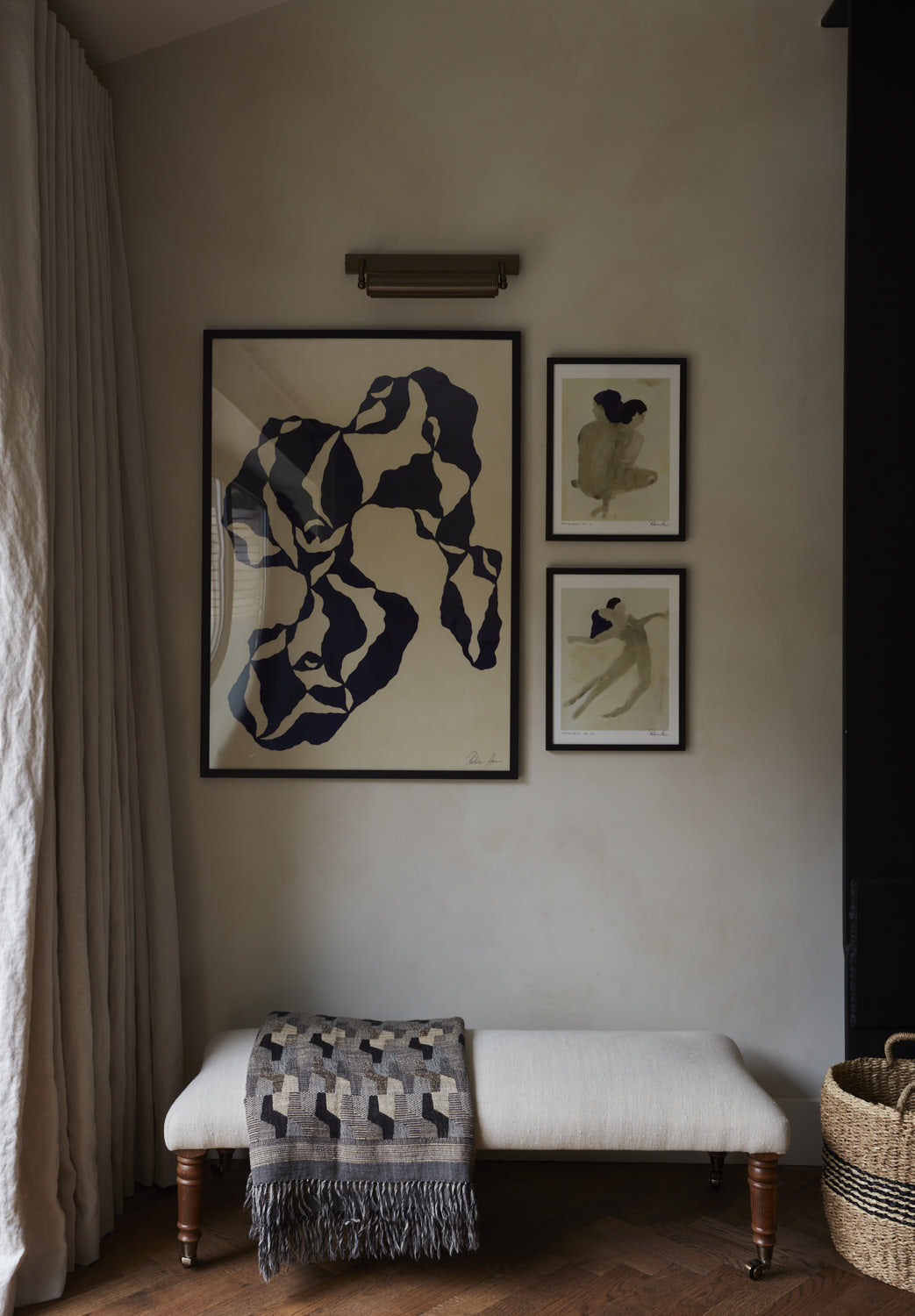 contemporary wall art with a small seating area