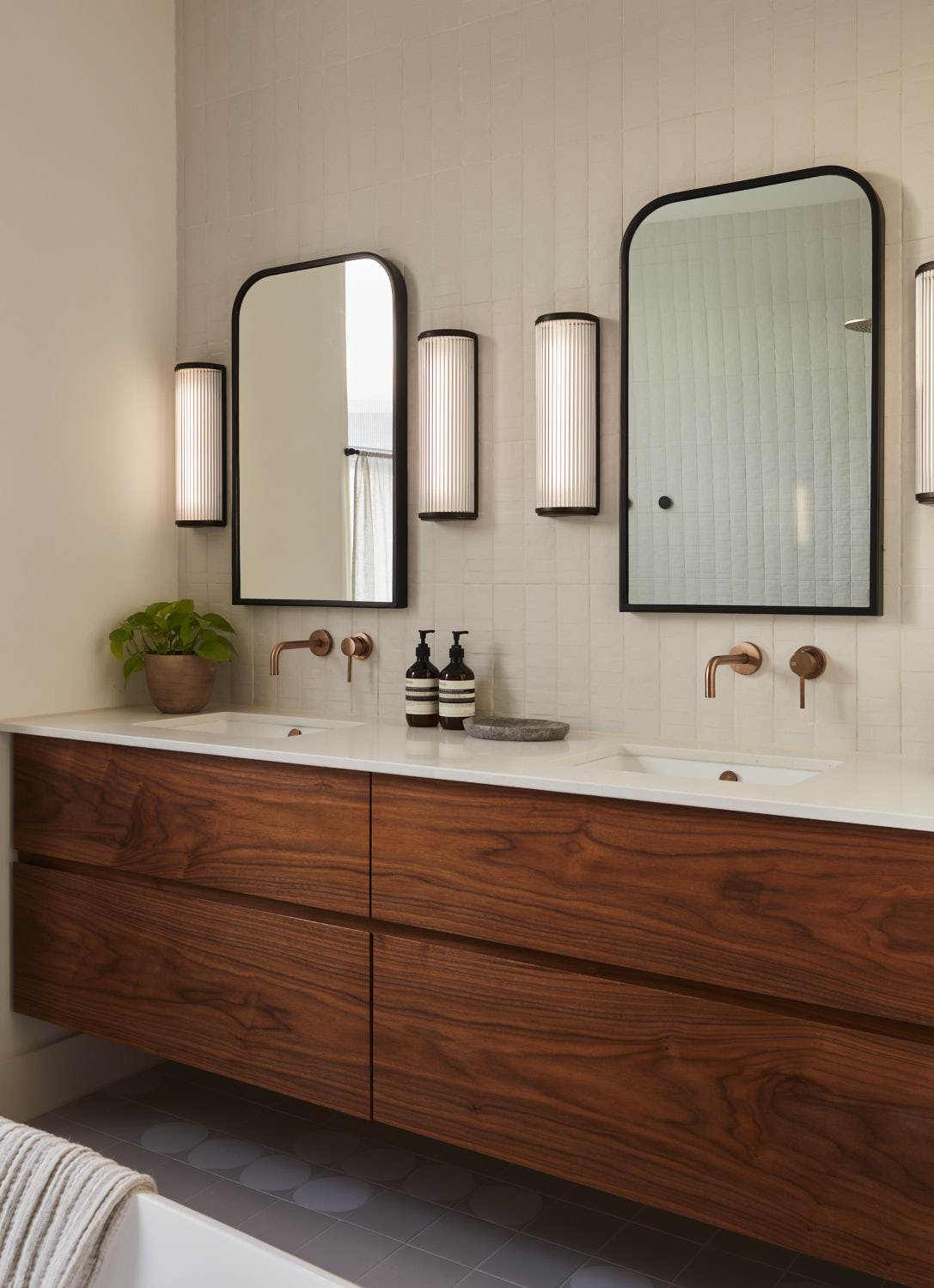 stylish wooden bathroom cabinet with a double sink and mirrors