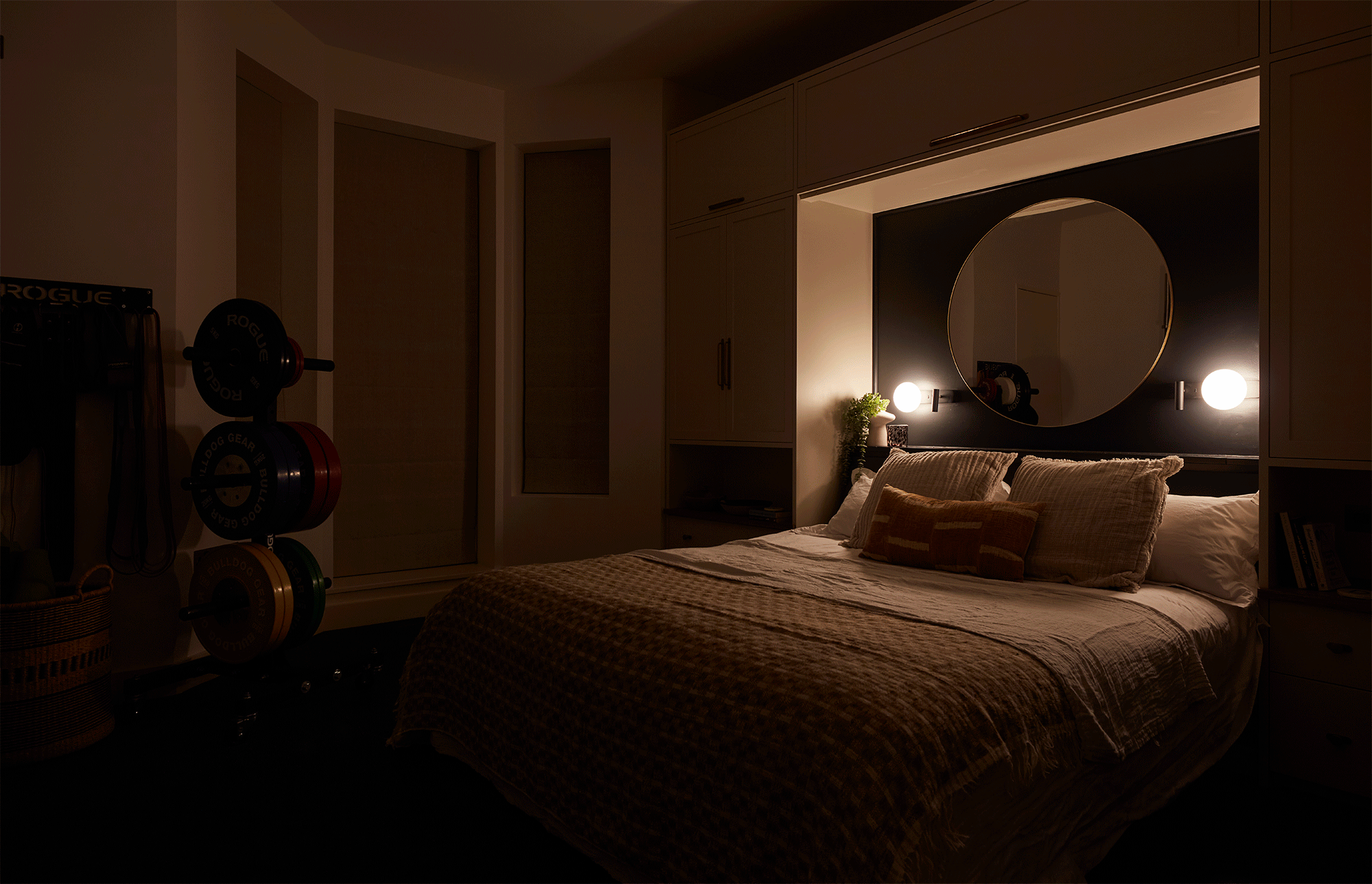 bedroom to gym with convertible bed and mood lighting